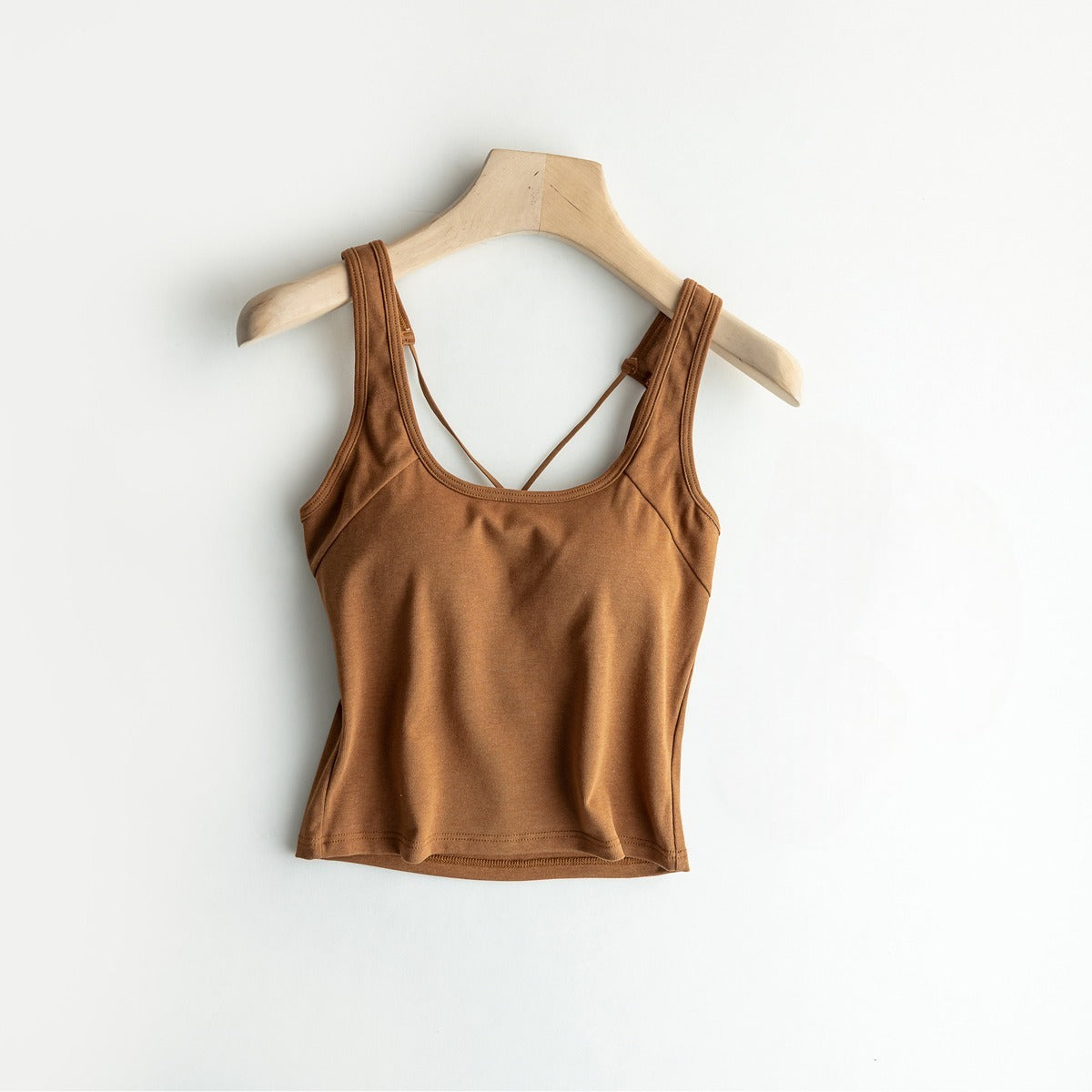 Top deportivo con sujetador incorporado y espalda cruzada de algodón